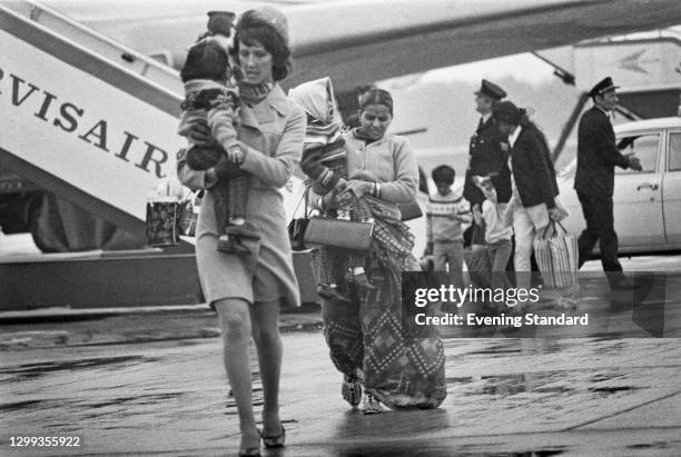 Ugandan Asians arrive at Stansted Airport on the first of several specially chartered flights to Britain, shortly after Ugandan military dictator Idi...