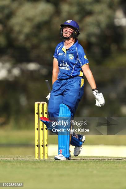 Rebecca Carter of the Meteors looks dejected after being dismissed during the WNCL match between the Queensland Fire and ACT Meteors at EPC Solar...