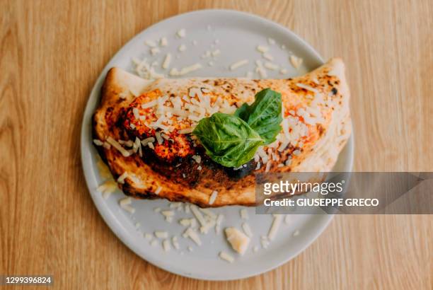 calzone napoletano - calzone stock pictures, royalty-free photos & images