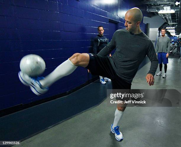 Manny Malhotra of the Vancouver Canucks warms up for the NHL game against Minnesota Wild at Rogers Arena October 22, 2011 in Vancouver, British...