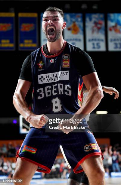 Issac Humphries of the 36ers celebrates a slam dunks during the round three NBL match between the Adelaide 36ers and the Sydney Kings at Adelaide...