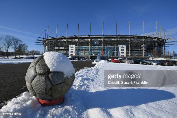 General view outside the stadium where a football is seen in the snow prior to the Second Bundesliga match between Hamburger SV and SC Paderborn 07...