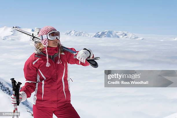 skier standing on mountainside - alpe d'huez stock pictures, royalty-free photos & images