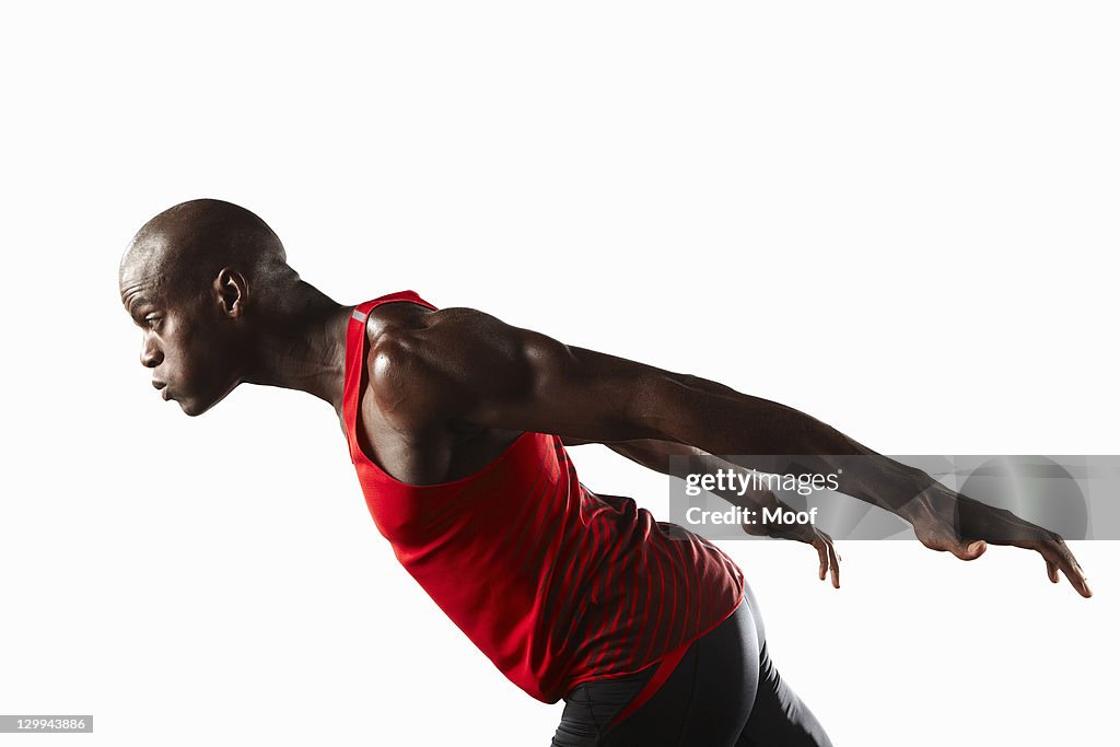 Profile of athlete lunging