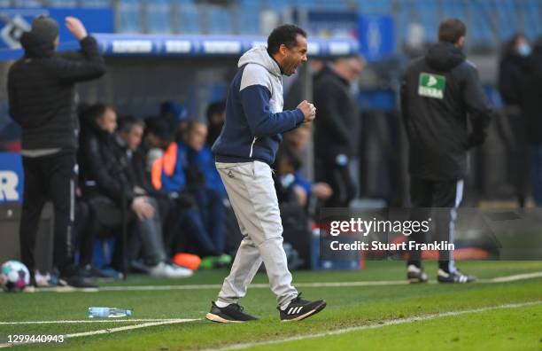 Daniel Thioune, Head Coach of Hamburger SV celebrates following his team's victory in the Second Bundesliga match between Hamburger SV and SC...