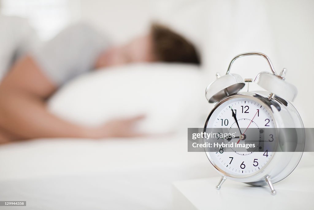 Close up of alarm clock on bedside table