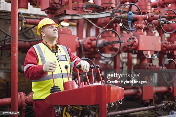 Oil Machine Operator 2,787 Man Operating Machinery Stock Photos, High-Res Pictures, and ...