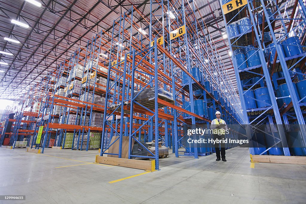 Worker standing in warehouse