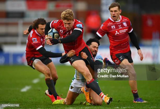 Ollie Thorley of Gloucester is tackled by Matt Proctor of Northampton Saints during the Gallagher Premiership Rugby match between Gloucester and...