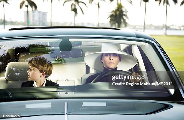 Barron Trump and Melania Trump pose during a photo shoot at the Mar-a-Lago Club on March 26, 2011 in Palm Beach, Florida. Melania's clothes by...