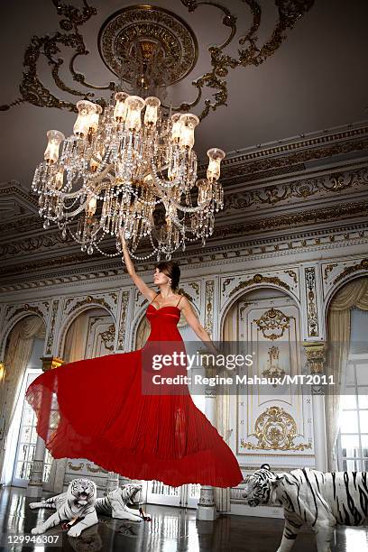 Melania Trump poses during a photo shoot at the Mar-a-Lago Club on March 26, 2011 in Palm Beach, Florida. Melania's clothes by Chanel, makeup by Tina...