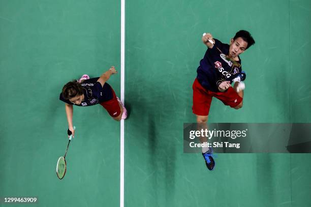 Dechapol Puavaranukroh and Sapsiree Taerattanachai of Thailand compete in the Mixed Doubles semi finals match against Thom Gicquel and Delphine...