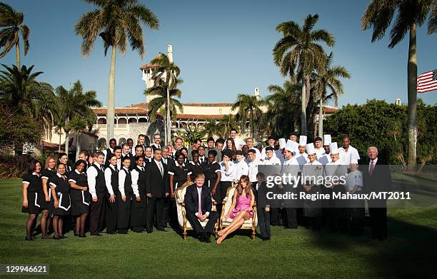 Donald Trump, Melania Trump and Barron Trump pose with household staff during a photo shoot at the Mar-a-Lago Club on March 26, 2011 in Palm Beach,...