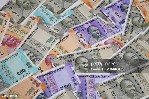 indian currency notes for backgrounds - india economy stockfoto's en -beelden