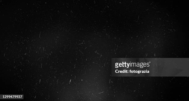 black background with scratches and dust - texture descrizione generale foto e immagini stock