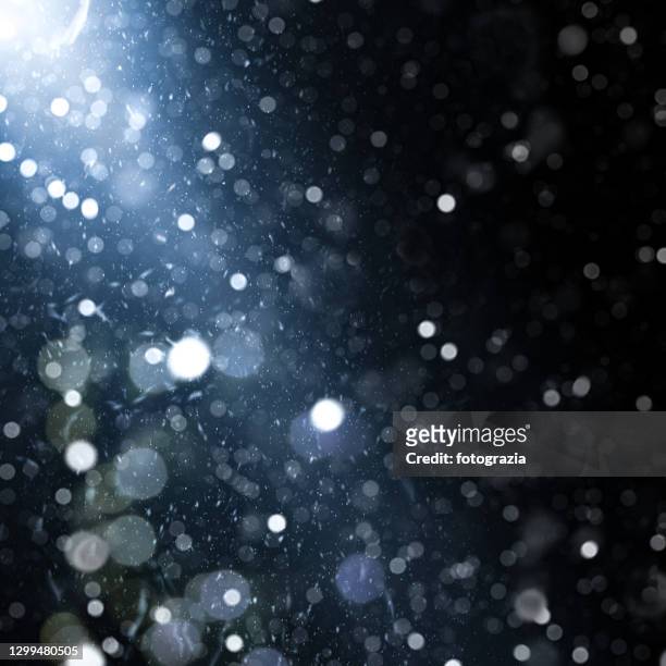 defocused lights and dust particles - blowing dust stock pictures, royalty-free photos & images