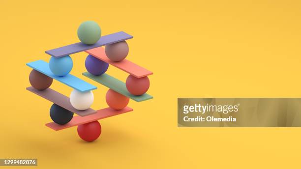jenga game color block tower with balls - leadership concepts stock pictures, royalty-free photos & images