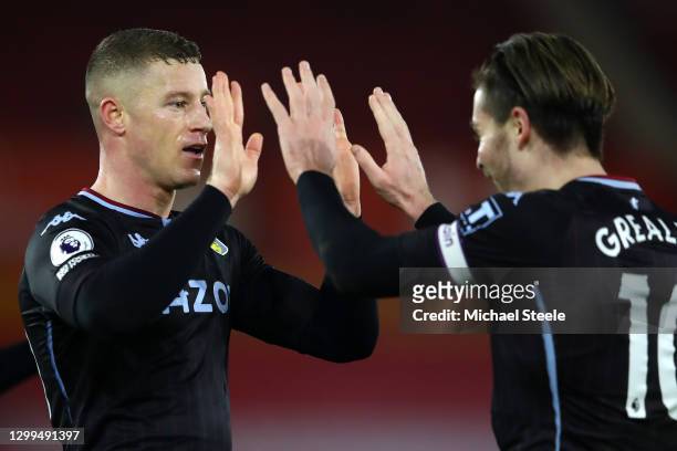 Ross Barkley of Aston Villa celebrates with team mate Jack Grealish after scoring their side's first goal during the Premier League match between...