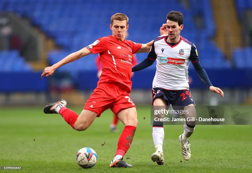 Hector Kyprianou of Leyton Orient holds off a challenge from Kieran Hector Kyprianou of Leyton Orient holds off a challenge from Kieran