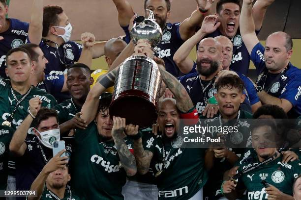 Felipe Melo and Gustavo Gomez of Palmeiras lift the Copa CONMEBOL Libertadores trophy after the final of Copa CONMEBOL Libertadores 2020 between...