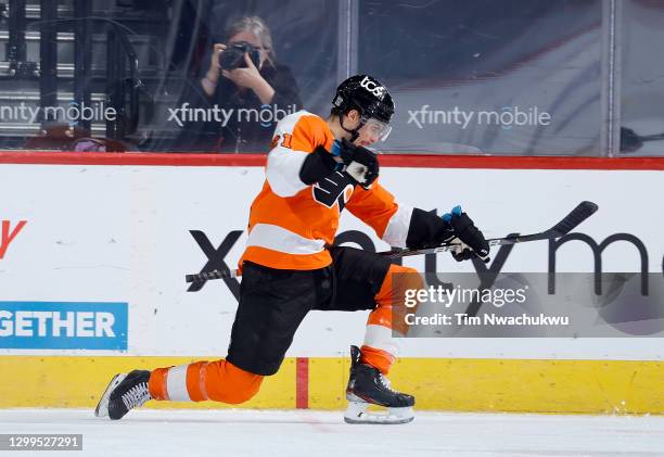 Scott Laughton of the Philadelphia Flyers celebrates after he scored the game winning goal in overtime against the New York Islanders at Wells Fargo...
