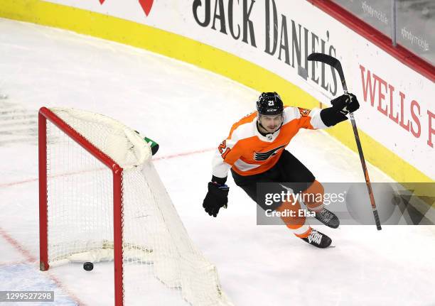 Scott Laughton of the Philadelphia Flyers celebrates after he scored the game winning goal in overtime against the New York Islanders at Wells Fargo...