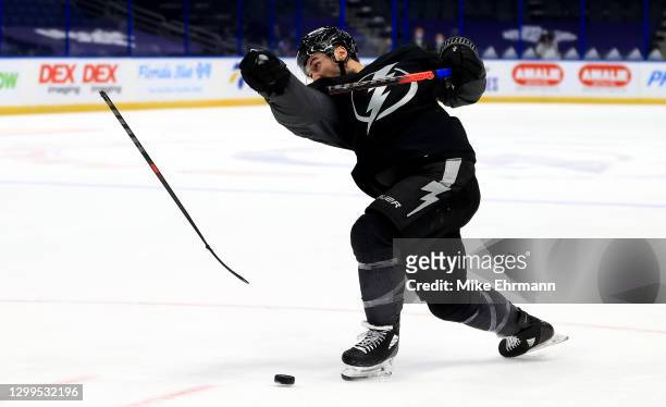 Tyler Johnson of the Tampa Bay Lightning breaks his stick shooting the puck during a game against the Nashville Predators at Amalie Arena on January...