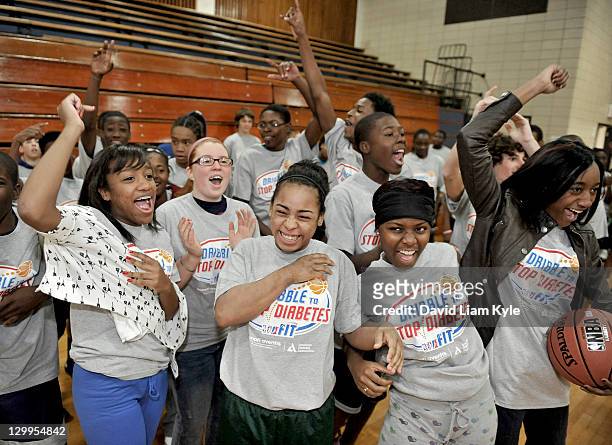 Approximately 100 girls and boys from the Cleveland school district participate in the WNBA FIT's Dribble to Stop Diabetes Clinic at Cleveland...