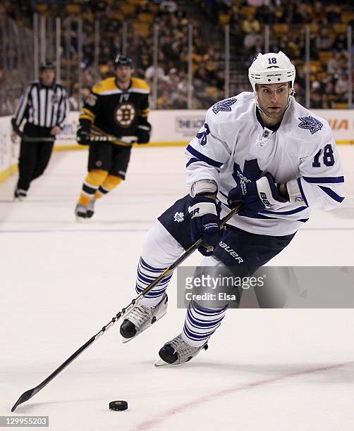 Mike Brown of the Toronto Maple Leafs takes the puck in the third period against the Boston Bruins on October 20, 2011 at TD Garden in Boston,...