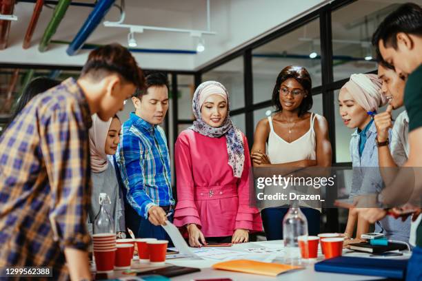 multi ethnic diverse business team in office, teamwork on new post-covid project - cultures stock pictures, royalty-free photos & images