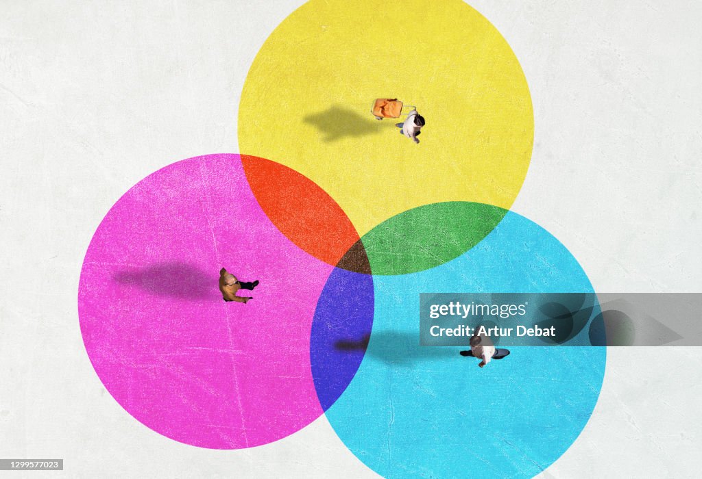 People from above inside colorful circles with social distancing.