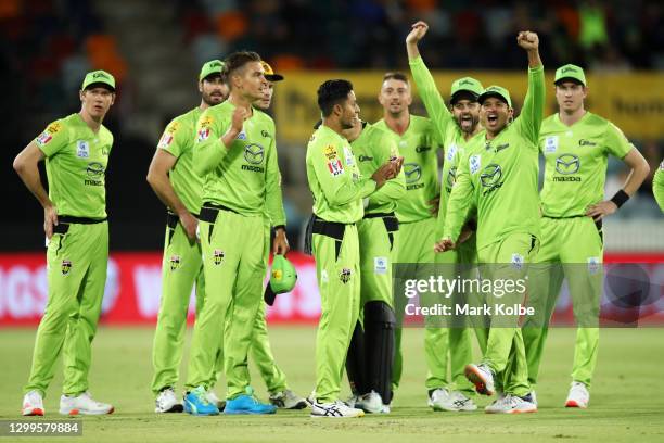 Of the Thunder celebrates the run out of Marnus Labuschagne of the Heat by Chris Green of the Thunder during the Big Bash League match between the...