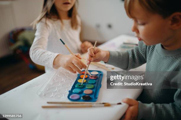 brother and sister painting - malfarbe stock pictures, royalty-free photos & images