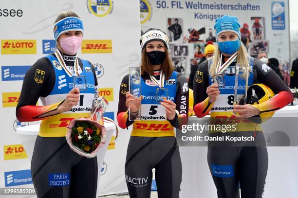 Natalie Geisenberger , Julia Taubitz and Dajana Eitberger of Germany celebrate after the Women's Singles competition during day 3 of the 50th FIL...