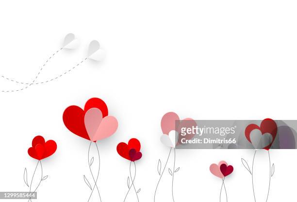 paper hearts that looks like flowers and butterflies on top of hand-drawn branches on white background - married stock illustrations