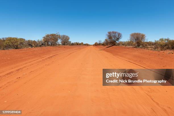 the red center - red dirt stock pictures, royalty-free photos & images