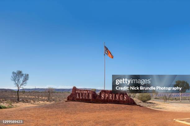 welcome to alice springs - alice springs stock pictures, royalty-free photos & images