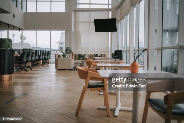 interior of co sharing office cafe area  lot in day time - office background stock pictures, royalty-free photos & images
