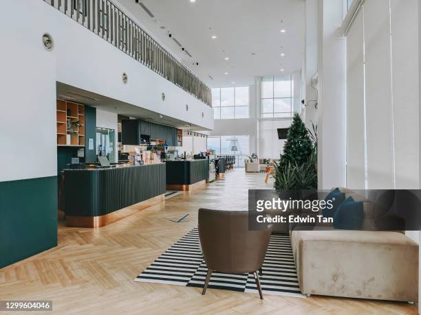 interior of reception co sharing office cafe area  lot in day time - lobby stock pictures, royalty-free photos & images