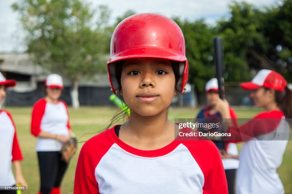 Teenage woman baseball player