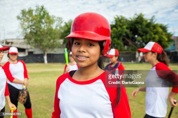 teenage woman baseball player - baseball team stock pictures, royalty-free photos & images