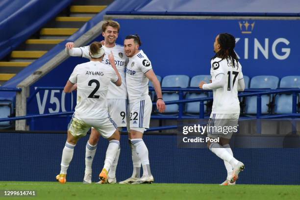 Jack Harrison of Leeds United celebrates with team mates Luke Ayling, Patrick Bamford and Helder Costa after scoring their side's third goal during...