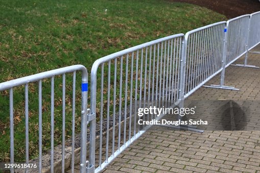 Temporary security barrier outside a government building to prevent political unrest Temporary security barrier outside a government building to prevent political unrest