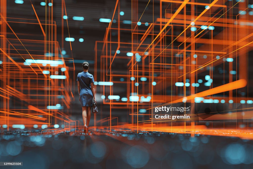 Futuristic city VR wire frame with businesswoman walking