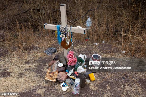 Crosses left by border activists mark the locations where the remains of migrants who died trying to cross into the United States through the harsh...