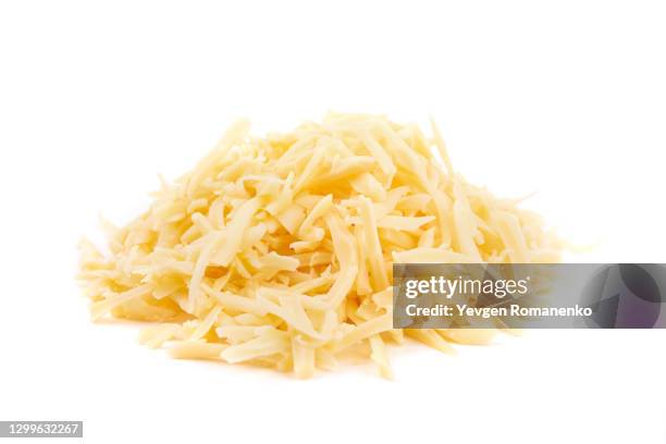 grated cheese isolated on white background - rallado fotografías e imágenes de stock