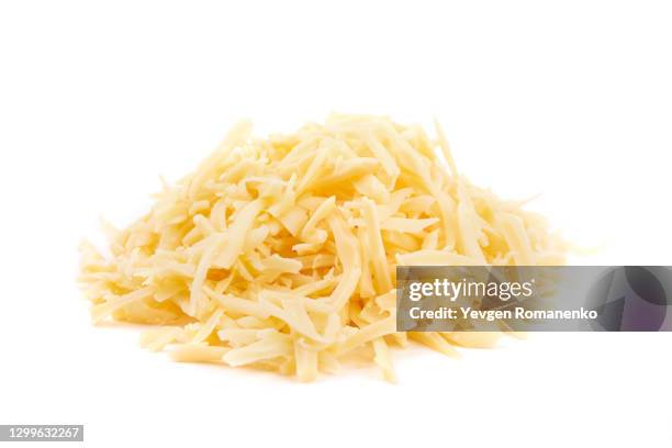 grated cheese isolated on white background - lanière objet manufacturé photos et images de collection