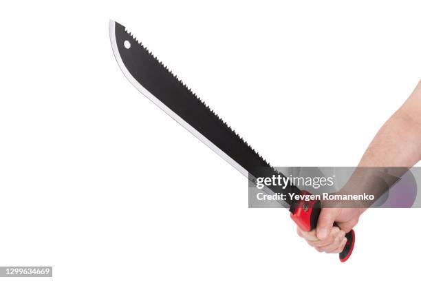 machete in mens hand isolated on white background - machete stockfoto's en -beelden