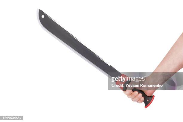 machete in mens hand isolated on white background - machete stock photos et images de collection