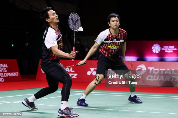 Mohammad Ahsan and Hendra Setiawan of Indonesia compete in the Men’s Double final match against Lee Yang and Wang Chi-Lin of Chinese Taipei on day...